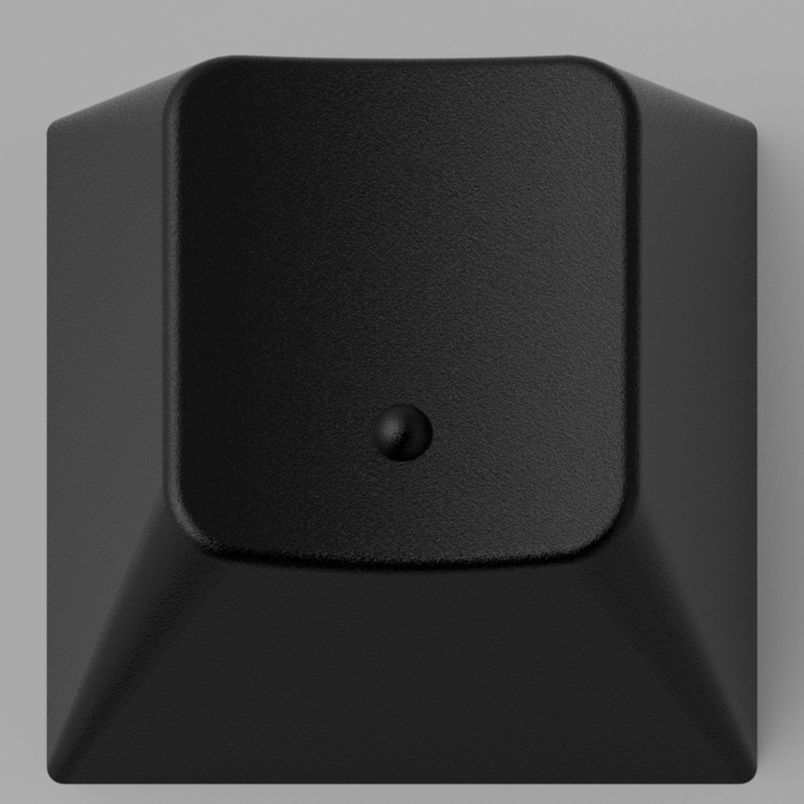Black keycap with a raised homing dot